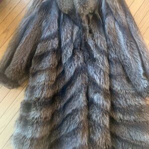 Raccoon 3/4 length real fur. Size Large.  No rips or marks on lining